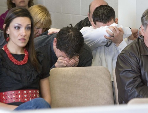 At the parole hearing of Thomas Noffsinger, the son's of Victor Aguilar, Victor (25) and Isaac (20) are overcome with emotion as they listen to the testimony of their mother as she recounts the day she had to tell her family that their father would never come home again. on  Tuesday, March 2,2010  photo:Paul Fraughton/ The Salt Lake Tribune