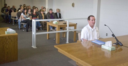 Thomas Noffsinger sits at a parole board hearing at the Utah State Prison in Draper on  Tuesday, March 2,2010. Behind him are  family members of Victor Aguilar, who was murdered by Noffsinger in 1989,  as well as family members of Annette Hill photo:Paul Fraughton/ The Salt Lake Tribune