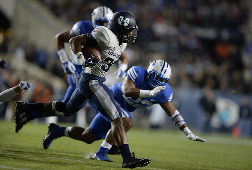 Scott Sommerdorf  |  The Salt Lake Tribune
USU RB Joe Hill runs during first half play. Utah State led BYU 28-14 at the half in Provo, Friday, October 1, 2014.