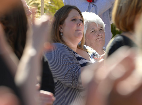 Leah Hogsten  |  The Salt Lake Tribune
l-r Melinda Castallanos spoke on behalf of her father and mother Jana Tucker (right) about her brother Joey Tucker's shooting death in August 2009 at the Families Speak Out On Police Violence rally Saturday, October 4, 2014, at the Matheson Courthouse.