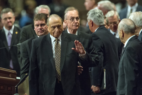Chris Detrick  |  The Salt Lake Tribune
LDS President Thomas S. Monson waves during the morning session of the 184th Semiannual General Conference of The Church of Jesus Christ of Latter-day Saints at the Conference Center in Salt Lake City Saturday October 4, 2014.