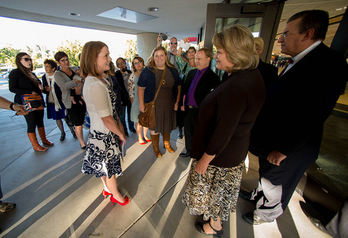 Trent Nelson  |  The Salt Lake Tribune
Abby Hansen, left, leads a group of women to the door of BYU's Marriott Center, where they are briefly stopped by volunteers Karen and Michael Roberts before being let in to watch a broadcast of the LDS General Priesthood Session, in Provo Saturday October 4, 2014.