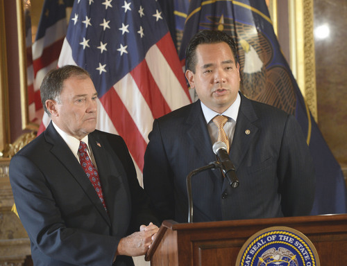 Al Hartmann  |  The Salt Lake Tribune
Utah Governor Gary Herbert, left, and Utah Attorney General Sean Reyes speak at a press conference at the state Capitol Monday October 6, 2014, regarding the U.S. Supreme Court's decision not to hear the state's argument in its defense of marriage law, which now opens the door for same-sex marriage in the state of Utah.