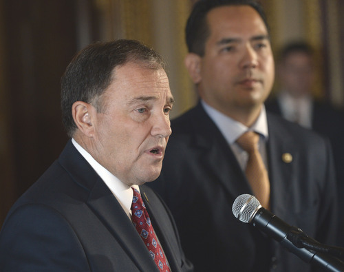 Al Hartmann  |  The Salt Lake Tribune
Utah Governor Gary Herbert, left, and Utah Attorney General Sean Reyes speak at press conference at the state capitol Monday October 6 regarding the U.S. Supreme Court's decision not to hear the state's argument in it's defense of marriage law which now opens the door for same sex marriage in the state of Utah and other states.