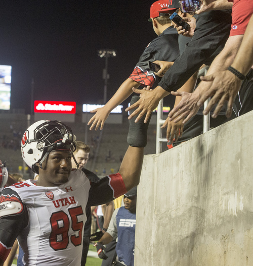 Rick Egan  |  The Salt Lake Tribune

Utah Utes defensive end Greg Reese (85) high-fives Utah fans as he heads to the locker room after the Utes beat UCLA 30-28 in Pac-12 action at the Rose Bowl, Saturday, October 4, 2014