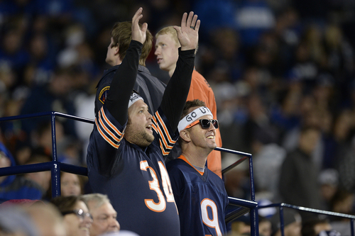 Scott Sommerdorf  |  The Salt Lake Tribune
USU fans dressed as Chicago Bears players Walter Payton and Jim McMahon cheer USU during the win over BYU. Utah State defeated BYU 35-20 in Provo, Friday, October 1, 2014.