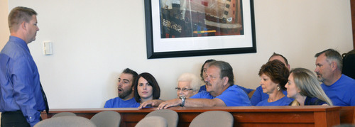 Al Hartmann  |  The Salt Lake Tribune
Family and supporters of former West Valley City police officer Shaun Cowley, left, talk during a recess in his three-day preliminary hearing in Judge L.A. Dever's courtroom in Salt Lake City Monday October 6, 2014.  Cowley is charged with second-degree felony manslaughter in the Nov. 2, 2012, fatal shooting of 21-year-old Danielle Willard.
