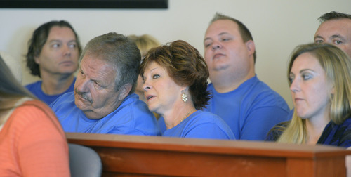 Al Hartmann  |  The Salt Lake Tribune
Family and supporters of former West Valley City police officer Shaun Cowley (dressed in blue shirts) listen to testimony in his three-day preliminary hearing in Judge L.A. Dever's courtroom in Salt Lake City Monday October 6, 2014.  Cowley is charged with second-degree felony manslaughter in the Nov. 2, 2012, fatal shooting of 21-year-old Danielle Willard.