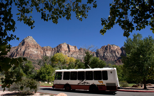 Steve Griffin  |  The Salt Lake Tribune

A shuttle bus leaves the Zion Canyon Village just outside Zion National Park near Springdale, Utah Monday, Sept. 30, 2013. National parks across the country, including Zion, announced their "fee-free" days for 2015.