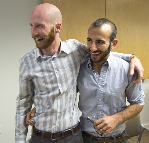 Steve Griffin  |  The Salt Lake Tribune

Derek Kitchen, left, hugs his partner, Moudi Sbeity, following a press conference at Magleby and Greenwood law offices in Salt Lake City, Monday, October 6, 2014.