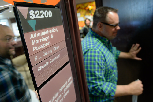 Francisco Kjolseth  |  The Salt Lake Tribune
Zachary Smallwood, left, and Jason McDermaid, who have been together for eight years, leave the Salt Lake County Complex after filling out a marriage license, becoming the second same-sex couple to show up on Monday morning. The U.S. Supreme Court declined to review all five pending same-sex marriage cases on Monday, Oct. 6, 2014 effectively legalizing gay and lesbian unions, clearing the way for such marriages to proceed in 11 new states - including Utah.