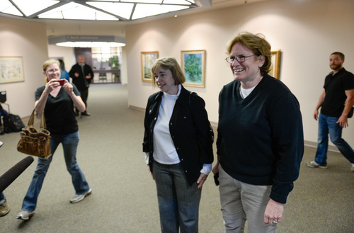 Francisco Kjolseth  |  The Salt Lake Tribune
Suzanne Marelius, left, and Kelli Frame become the first same-sex couple to apply for a marriage license at the Salt Lake County Complex on Monday morning. The U.S. Supreme Court declined to review all five pending same-sex marriage cases on Monday, Oct. 6, 2014 effectively legalizing gay and lesbian unions, clearing the way for such marriages to proceed in 11 new states - including Utah.