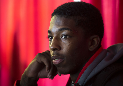 Steve Griffin  |  The Salt Lake Tribune

Delon Wright smiles as he talks with reporters during media day at the Huntsman Center on the University of Utah campus in Salt Lake City, Monday, October 6, 2014.