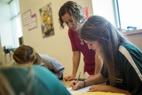 Chris Detrick  |  The Salt Lake Tribune
Teacher Afton Brown helps senior Nicole Rudd in her AP calculus class at Hillcrest High School Wednesday October 8, 2014.
