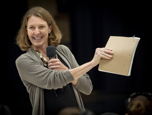 (Michael Mangum  |  Special to the Tribune)

Salt Lake City Council staff member Allison Rowland addresses the crowd before the beginning of a public meeting at Parkview Elementary School on Tuesday, October 7, 2014.