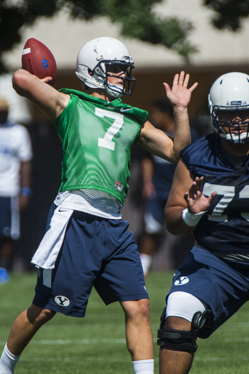 Chris Detrick  |  The Salt Lake Tribune
Brigham Young Cougars quarterback Christian Stewart (7) during a practice at Richards Building Fields Friday August 1, 2014.