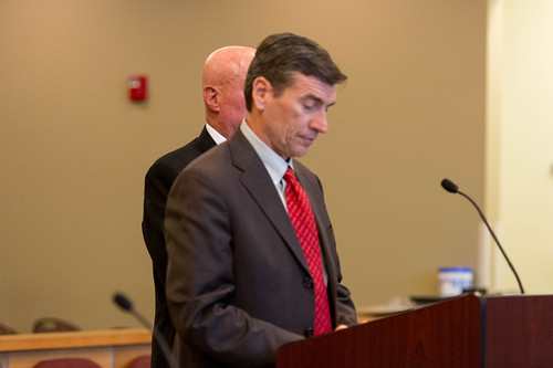 Trent Nelson  |  The Salt Lake Tribune
Bruce Wisan deliberately stands behind his attorney Greg Skordas (in red tie) during his appearance in a Taylorsville court room on a charge of contempt of court and a misdemeanor count of soliciting a prostitute, Thursday October 9, 2014.