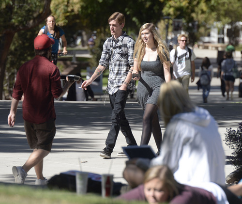 Al Hartmann  |  The Salt Lake Tribune
University of Utah students walk between classes near the Marriott Library Tuesday October 8.