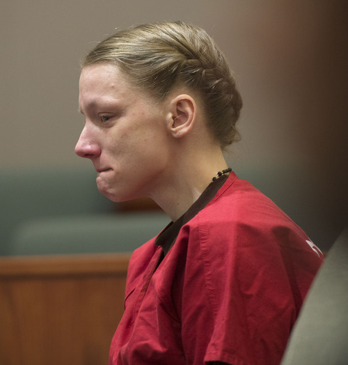 Steve Griffin  |  The Salt Lake Tribune


Stephanie Sloop, weeps during her status conference in the Davis Justice Center in February 2014.  Sloop is charged in the death of her son Ethan Stacy. On Thursday, her lawyer argued that there is evidence that proves her innocence.