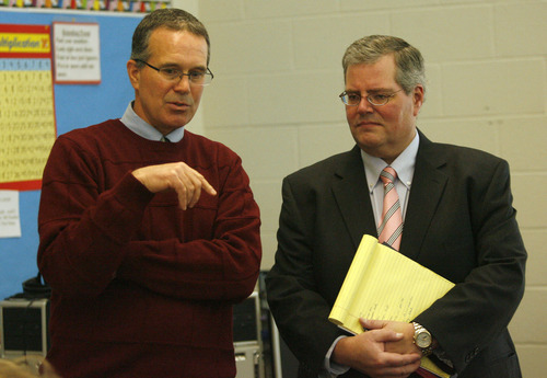 Rick Egan  | The Salt Lake Tribune 

Odyssey Elementary School Principal Dale Wilkinson (left) chats with Brad Smith, superintendent of Ogden School District, during a visit to Odyssey Elementary School, Jan. 5, 2012.