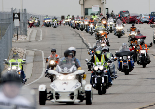 Steve Griffin  |  The Salt Lake Tribune
Motorcycle riders leave Hill Air Force Base as they join forces with civilian riders during the fourth-annual See Me, Save Me campaign motorcycle ride in Ogden on July 11, 2013.
