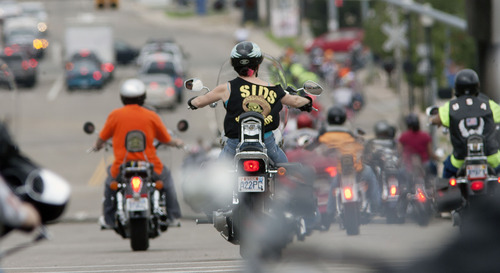 Steve Griffin  |  Tribune file photo
Civilian riders join forces with riders from Hill Air Force Base during the fourth-annual See Me, Save Me campaign motorcycle ride in Ogden in July 2013.