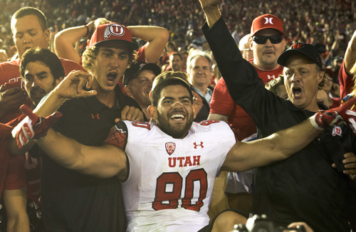 Rick Egan  |  The Salt Lake Tribune

Utah Utes tight end Westlee Tonga (80) celebrates with Utah fans as the Utes held on for a 30-28 upset over UCLA in Pac-12 action at the Rose Bowl, Saturday, October 4, 2014