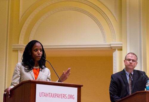 Trent Nelson  |  The Salt Lake Tribune
Utah 4th Congressional District Candidates Mia Love and Doug Owens share the stage for a debate at the annual Utah Taxes Now Conference at the Grand America Hotel in Salt Lake City Tuesday May 20, 2014.