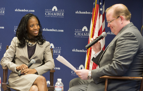 Rick Egan  |  The Salt Lake Tribune

Fourth District candidate Mia Love  waits for her question from Justin Jones (right) listens as she answered questions separately from her opponent, Doug Owens, at the Salt Lake Chamber of Commerce, Thursday, September 25, 2014.  Love declined to participate in a joint event and asked to appear first.