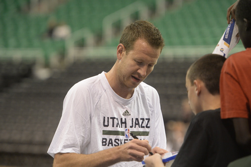 Rick Egan  |  The Salt Lake Tribune

 Utah Jazz forward Steve Novak (16) signs autographs before the Utah Jazz faced the LA Clippers, at EnergySolutions Arena, Monday, October 13, 2014