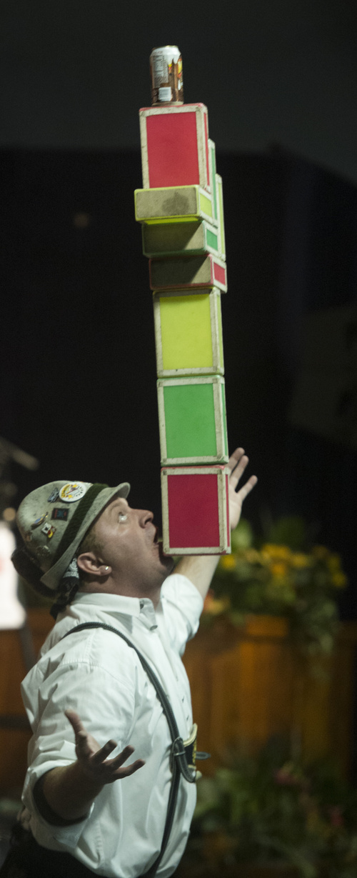 Rick Egan  |  The Salt Lake Tribune

Shan the Juggler balances a can of root beer on top of a stack of blocks as he entertains the crowd on the last day of the nine-week Oktoberfest celebration at Snowbird, Sunday, October 12, 2014