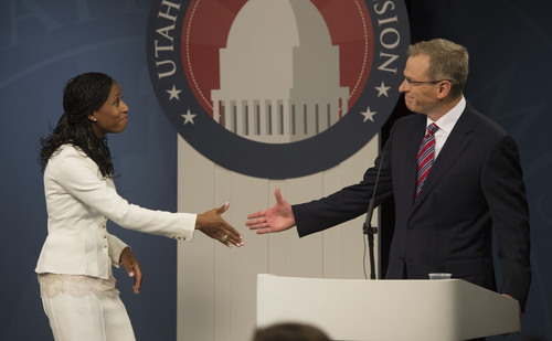 Steve Griffin  |  The Salt Lake Tribune


Mia Love shakes hands with Doug Owens following a debate in the 4th District, in Utah's premier congressional matchup at the Dolores Dor» Eccles Broadcast Center on the University of Utah campus in Salt Lake City, Tuesday, October 14, 2014.