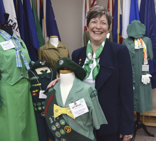 Al Hartmann  |  The Salt Lake Tribune
Debbie Nielson, who has been acting CEO of the Girl Scouts of Utah, chuckles as she poses with a uniform she used to wear as a girl. She will be nominated to the national board this week when the Girl Scout National Convention comes to Salt Lake City. It's the first time the convention has come to Salt Lake City and it's the first time a Utahn will serve on the national board.