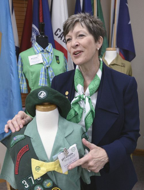 Al Hartmann  |  The Salt Lake Tribune
Debbie Nielson, who has been acting CEO of the Girl Scouts of Utah, chuckles as she poses with a uniform she used to wear as a girl. She will be nominated to the national board this week when the Girl Scout National Convention comes to Salt Lake City. It's the first time the convention has come to Salt Lake City and it's the first time a Utahn will serve on the national board.