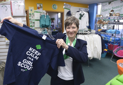 Al Hartmann  |  The Salt Lake Tribune
Debbie Nielson, who has been acting CEO of the Girl Scouts of Utah, holds a popular shirt at the Girl Scout store.  She will be nominated to the national board this week when the Girl Scout National Convention comes to Salt Lake City. It's the first time the convention has come to Salt Lake City and it's the first time a Utahn will serve on the national board.