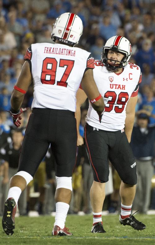 Rick Egan  |  The Salt Lake Tribune

Utah Utes tight end Siale Fakailoatonga (87) and Utah place kicker Andy Phillips (39) celebrate Phillips' field goal, giving the Utes a 30-28 lead with 34 seconds left in the game, at the Rose Bowl in Pasadena, Saturday, October 4, 2014