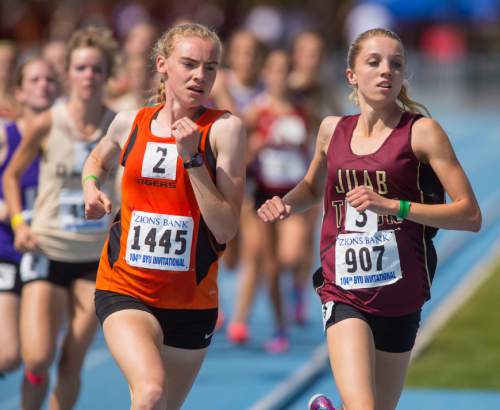 Trent Nelson  |  The Salt Lake Tribune
Ogden's Sarah Feeny and Juab's Kashley Carter run in the girls 1600 meter at the BYU Invitational high school track & field meet in Provo Saturday May 3, 2014. Feeny took first, Carter second.