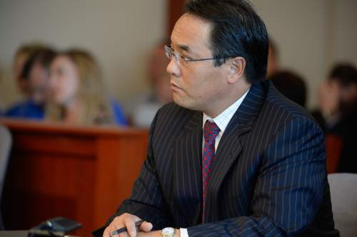 Francisco Kjolseth  |  The Salt Lake Tribune
Prosecutor Blake Nakamura listens as Judge L.A. Dever rules that  former West Valley City police officer Shaun Cowley will not have to stand trial on Thursday, Oct. 9, 2014. Cowley was being charged with second-degree felony manslaughter in connection with the Nov. 2, 2012 fatal shooting of 21-year-old Danielle Willard.