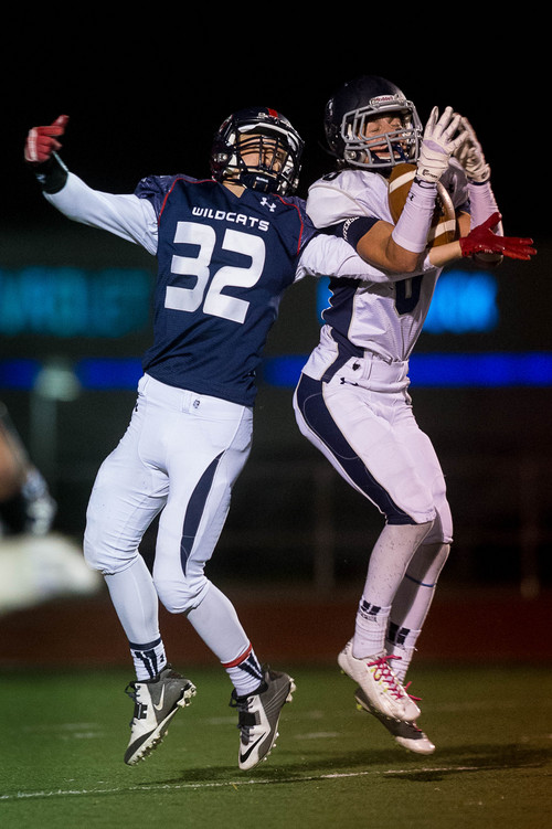 Trent Nelson  |  The Salt Lake Tribune
Corner Canyon's Jake Cahoon makes a pick ahead of Woods Cross's James Gilbert as Woods Cross hosts Corner Canyon High School football, in Woods Cross, Wednesday October 15, 2014.