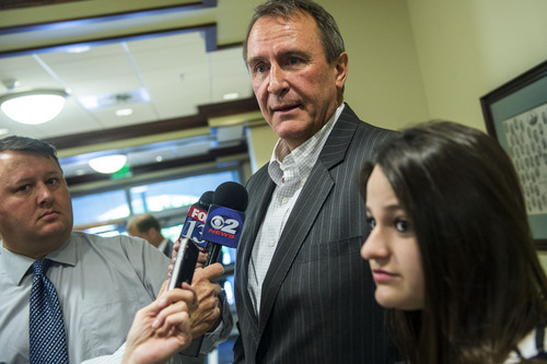 Chris Detrick  |  The Salt Lake Tribune
Former Attorney General Mark Shurtleff and his daughter Annie talk to members of the media after a committee hearing at the State Capitol Wednesday June 18, 2014.