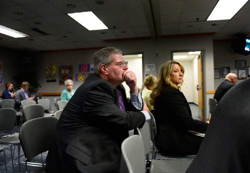 Scott Sommerdorf  |  The Salt Lake Tribune
Brad Smith listens to the end of the state school board meeting, Friday, October 10, 2014, just before they moved into executive session in order to confirm him as the new Superintendant. A divided State School Board picked Ogden School District Superintendent Brad Smith on Friday as Utah's next state superintendent of public instruction.