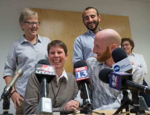 Steve Griffin  |  The Salt Lake Tribune

Excited couples Laurie Wood, top left, and Kody Partridge, and Moudi Sbeity, top right, and Derek Kitchen address the media during a press conference at Magleby and Greenwood law offices in Salt Lake City, Monday, October 6, 2014.