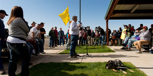 Trent Nelson  |  The Salt Lake Tribune
 San Juan County Commissioner Phil Lyman addresses protesters gathered in Blanding's Centennial Park  May 10, 2014, prior to an ATV ride into Recapture Canyon, closed to motorized use since 2007 to protect the seven-mile long canyon's archeological sites. Prosecutors allege Lyman led a "conspiracy" to promote the illegal ride by speaking at this rally and postings on social media.
