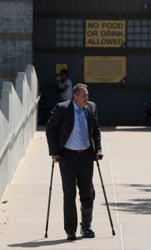 Francisco Kjolseth  |  The Salt Lake Tribune
Former Utah Attorney General Mark Shurtleff leaves the Salt Lake County Jail after being arrested earlier in the day on Tuesday, July 15, 2014.