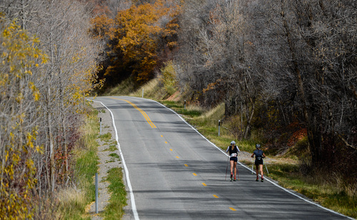 Francisco Kjolseth  |  The Salt Lake Tribune
A pair of roller skiers train for the upcoming season as they skate up Mountain Dell Canyon on Friday, Oct. 17, 2014, during a beautiful Fall day.