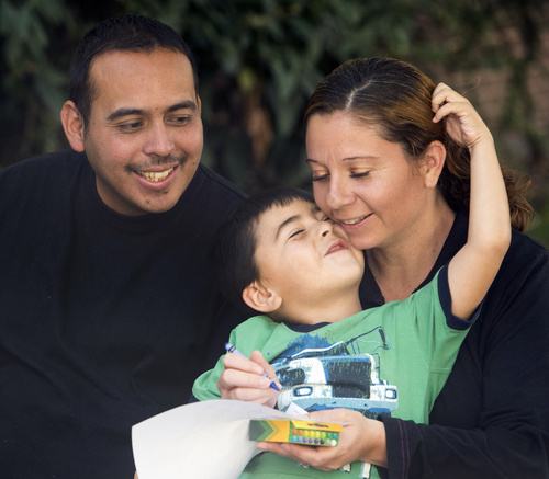 Rick Egan  |  The Salt Lake Tribune

Tony and Cynthia Martinez, with their  4-year-old son, Adrian, at the Road Home shelter, Friday, October 10, 2014