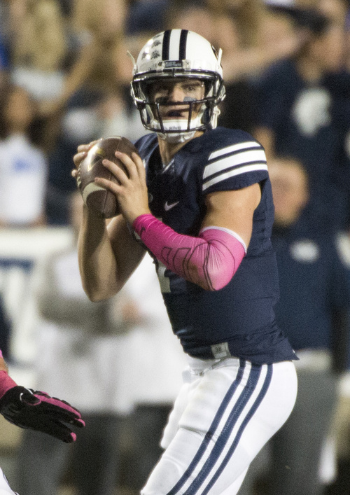 Rick Egan  |  The Salt Lake Tribune

Brigham Young Cougars quarterback Christian Stewart (7) gets set to throw,  in football action, BYU vs The Nevada Wolf Pack at Lavell Edwards Stadium, Saturday, October18, 2014