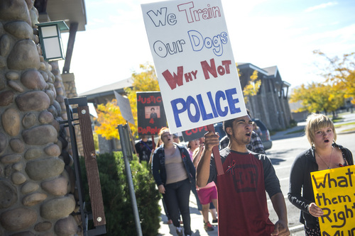 Chris Detrick  |  The Salt Lake Tribune
Darrien Hunt's brother Kerahn Jedidiah Hunt and other family and friends of Darrien Hunt and other community members participate in a rally calling for justice outside of the Saratoga Springs police department Saturday Oct. 18, 2014.  Hunt was fatally shot on Sept. 10 by officers responding to a call about a man with a sword walking down the street.
