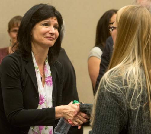 Rick Egan  |  The Salt Lake Tribune

Lily Eskelsen Garcia visits with Michele Jones, a teacher from Brockbank Jr. High in Magna, at the UEA convention at the South Towne Expo Center, Thursday, October 16, 2014