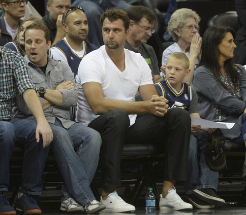 Rick Egan  |  The Salt Lake Tribune

Former Jazz play Mehmet Okur, watches from the front row, in pre-season NBA action, Utah Jazz vs. The LA Clippers at EnergySolutions Arena, Monday, October 13, 2014